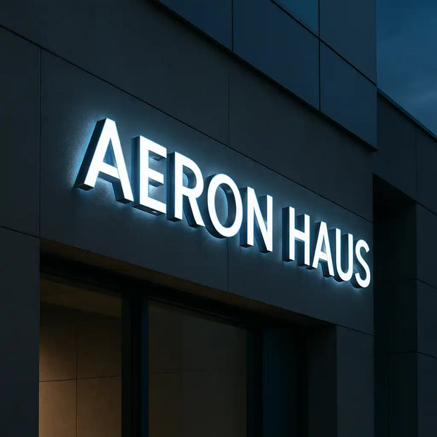 Aeron Haus illuminated building channel letters sign