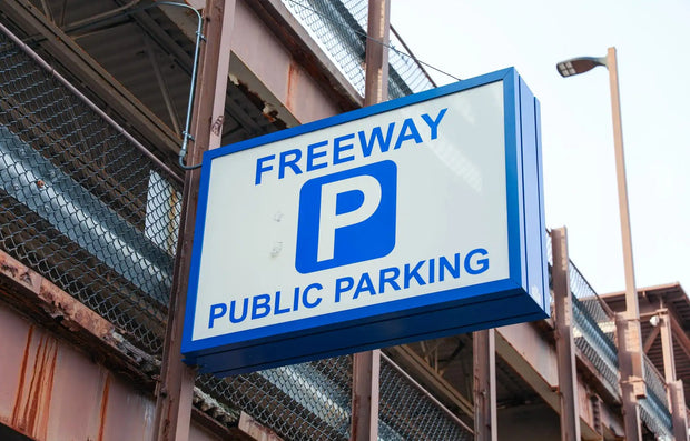 Freeway public parking sign exterior parking garage entrance